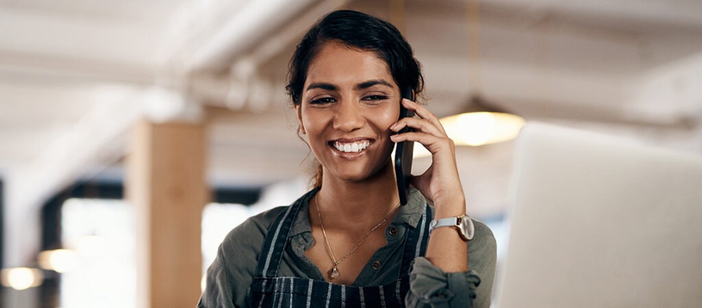 Friendly La Marsa customer representative on the phone answering customer inquiries on our contact page